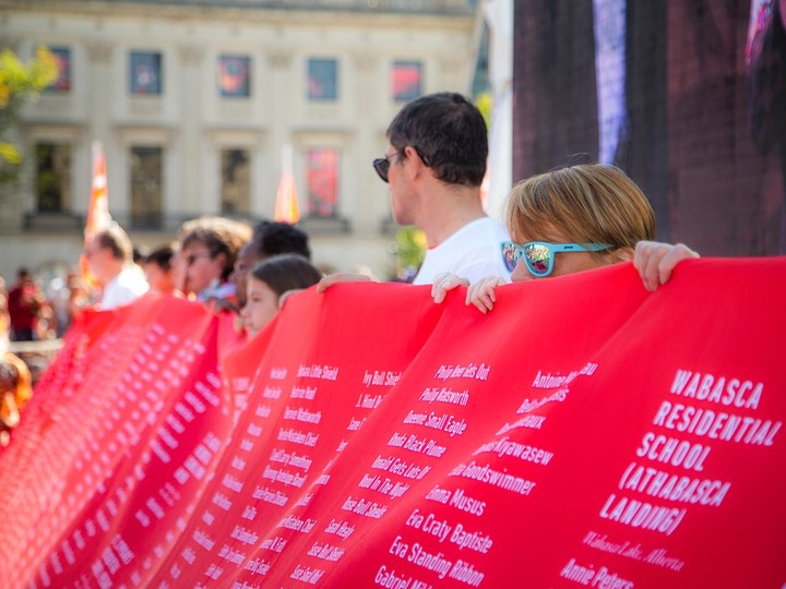  Parliament Hill was a sea of orange as a gathering was held to honour the National Day for Truth and Reconciliation on Saturday, September 30, 2023. A very long banner wrapped along the crowd of people that was filled with names of those killed in residential schools.