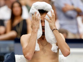 Daniil Medvedev of Russia cools down between games against Andrey Rublev of Russia during their Men's Singles Quarterfinal match on Day Ten of the 2023 US Open at the USTA Billie Jean King National Tennis Center on September 06, 2023.