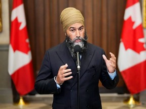 NDP Leader Jagmeet Singh speaks to reporters in the foyer of the House of Commons in Ottawa on Tuesday, September 19, 2023.