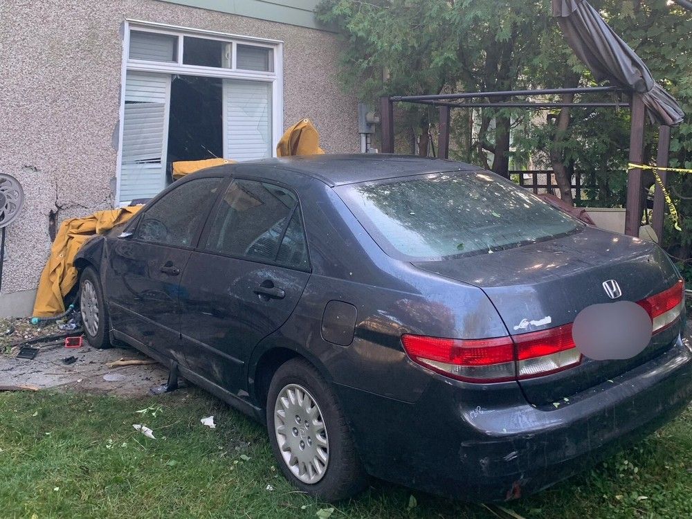 A car crashed into the rear of a home in Ottawa's south end Friday,. There were no injuries, but fire service specialists say the structure was destablized and not livable.