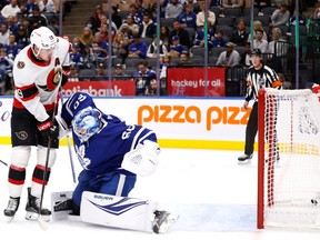 Ottawa Senators right wing Drake Batherson scoring on Toronto Maple Leafs goaltender Joseph Woll