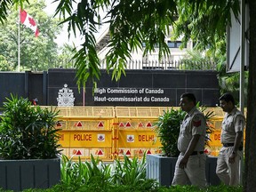 Security personnel stand guard in front of Canada's High Commission in New Delhi, India, on September 19, 2023.