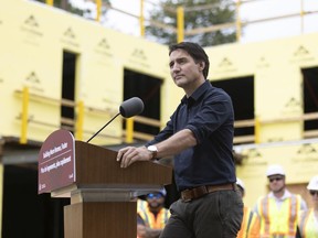 Prime Minister Justin Trudeau visits the construction site of an affordable housing project in London, Ont., Wednesday, Sept. 13, 2023.