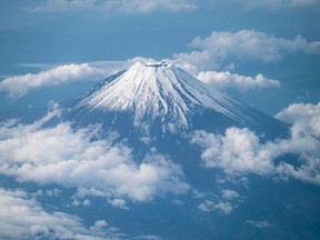 Mount Fuji seen from the window of a passenger aircraft