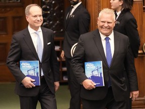 Ontario Finance Minister Peter Bethlenfalvy, left, and Premier Doug Ford at the legislature at Queen's Park in Toronto.