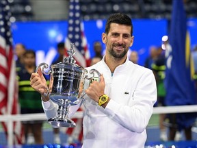 Novak Djokovic pictured with the U.S. Open trophy in New York on Sept 2023.