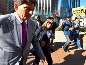 Tamara Lich walks to court in Ottawa with her lawyers Tuesday morning.