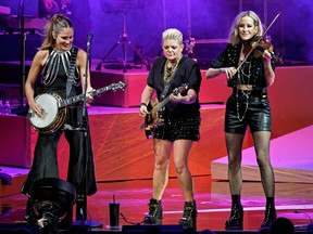 Emily Strayer, from left, Natalie Maines, and Martie Maguire of The Chicks perform.
