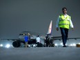 Prime Minister Justin Trudeau's plane is seen on the tarmac after being grounded due to a technical issue following the G20 Summit in New Delhi, India.