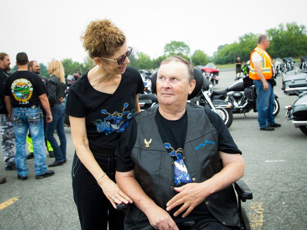 Robin Easey and his wife, Glennis Easey, watch the first annual Ride for Robin on Aug. 15, 2015. Easey, who died recently, was a former police officer shot when responding to an armed robbery at Bayshore Shopping Centre in 1984.