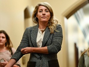 FILE: Minister of Foreign Affairs Melanie Joly arrives for a meeting of the federal cabinet on Parliament Hill in Ottawa, on Tuesday, Oct. 3, 2023.