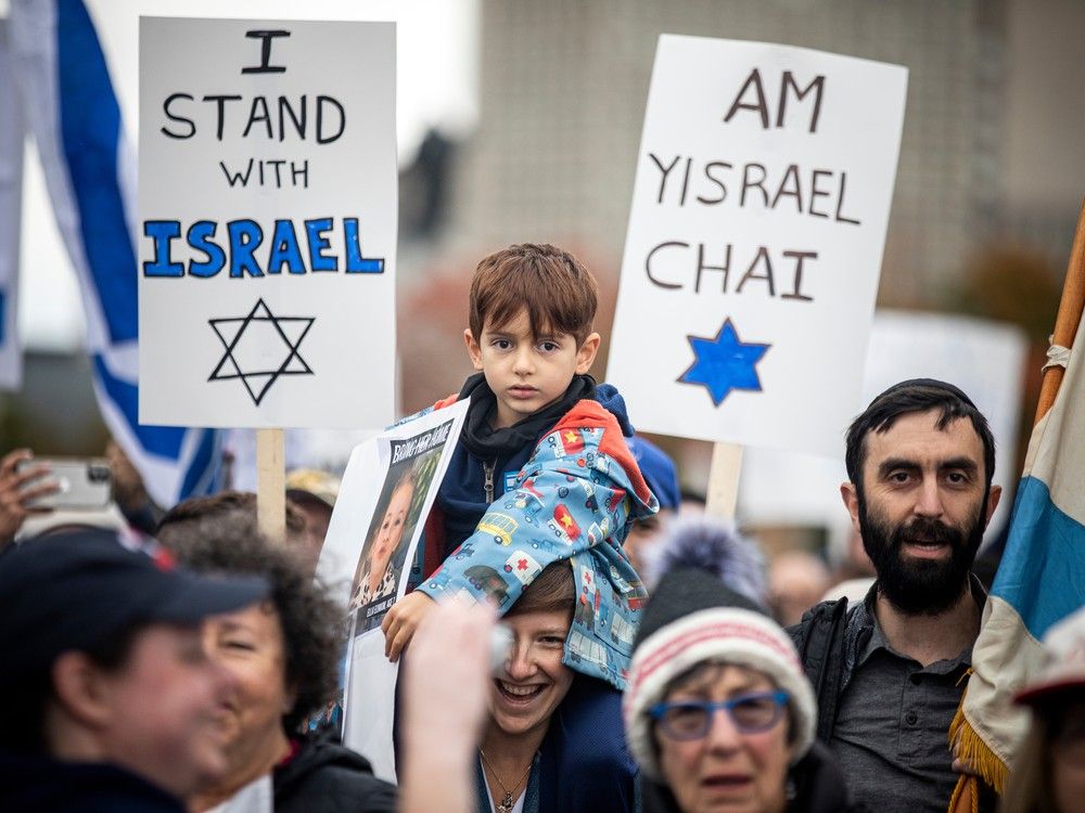 A rally in support of Israel started at City Hall and participants marched to Parliament Hill where speeches took place Sunday, October 15, 2023.
