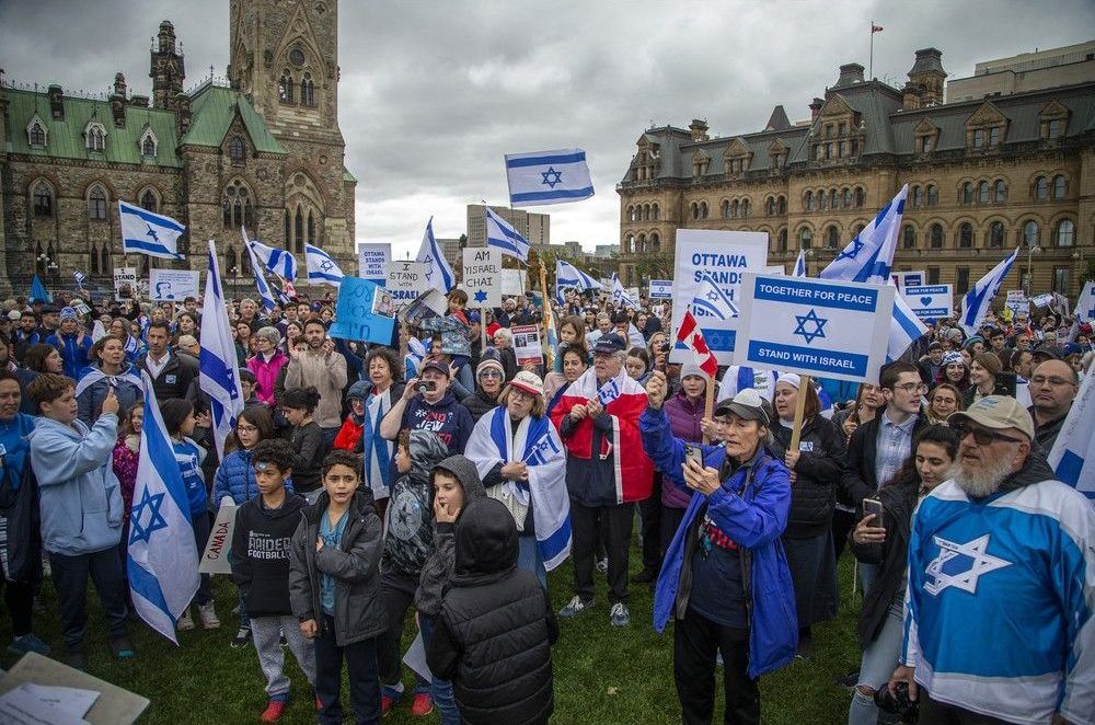 A rally in support of Israel started at City Hall and participants marched to Parliament Hill where speeches took place Sunday, October 15, 2023.