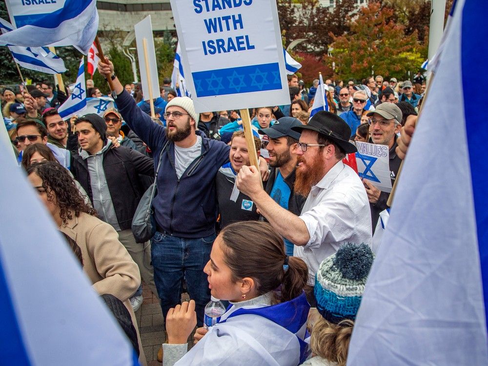 A rally in support of Israel started at city hall and participants marched to Parliament Hill where speeches took place Sunday, October 15, 2023.