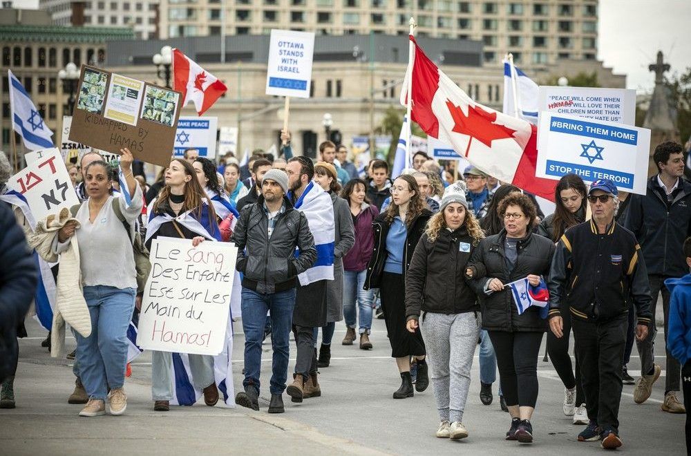 A rally in support of Israel started at City Hall and participants marched to Parliament Hill where speeches took place Sunday, October 15, 2023.