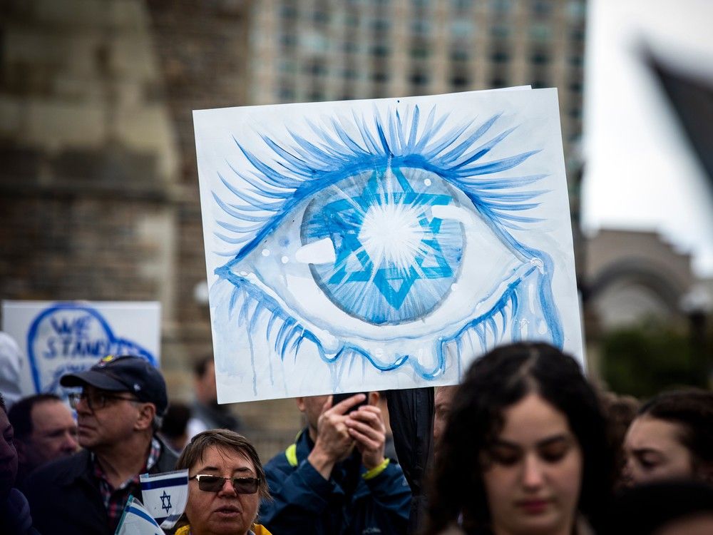 A rally in support of Israel started at City Hall and participants marched to Parliament Hill where speeches took place Sunday, October 15, 2023.