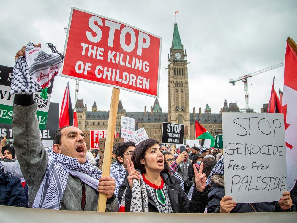 A large group organized by the Palestinian Youth Movement, INSAF UO, and the Students for Justice in Palestine Carleton came together on Parliament Hill then marched to the Embassy of Israel on O'Connor Street, Sunday, October 15, 2023.
