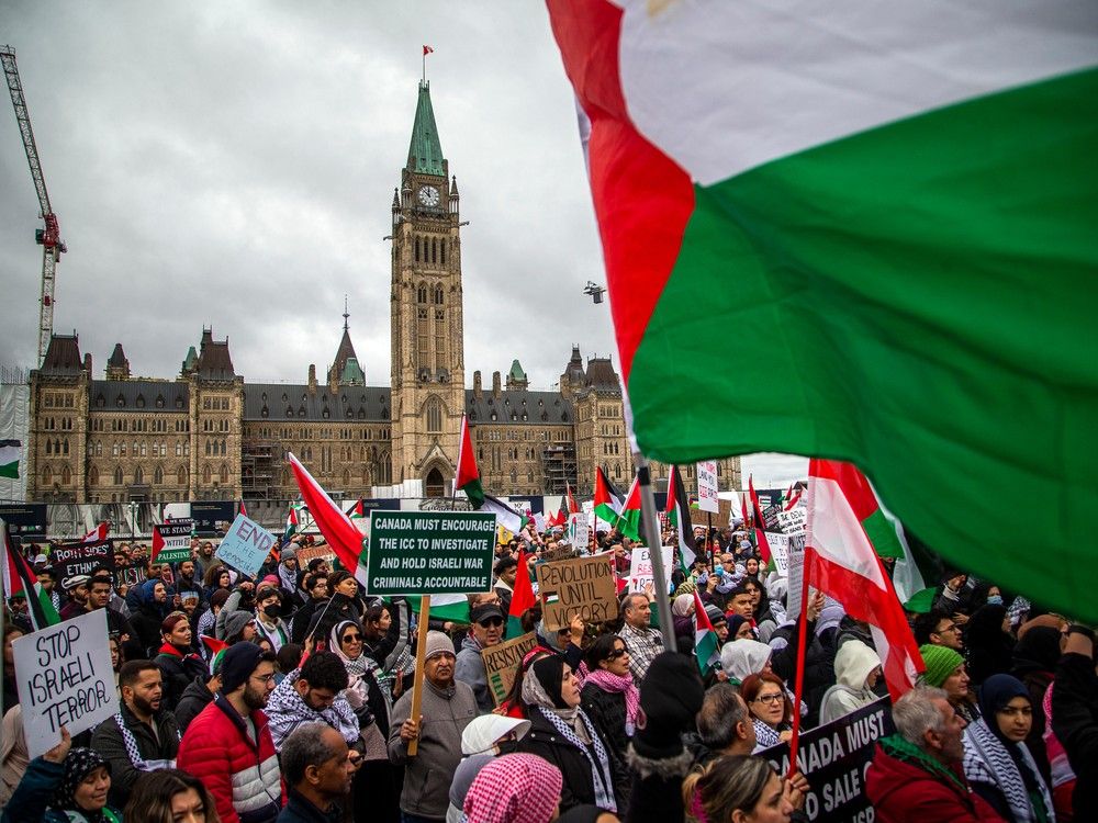 A large group organized by the Palestinian Youth Movement, INSAF UO, and the Students for Justice in Palestine Carleton came together on Parliament Hill then marched to the Embassy of Israel on O'Connor Street, Sunday, October 15, 2023.