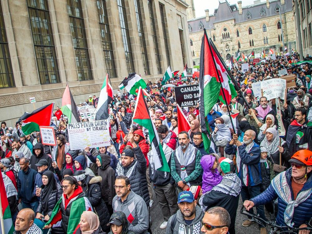 A large group organized by the Palestinian Youth Movement, INSAF UO, and the Students for Justice in Palestine Carleton came together on Parliament Hill, then marched to the Embassy of Israel on O'Connor Street, Sunday, October 15, 2023.