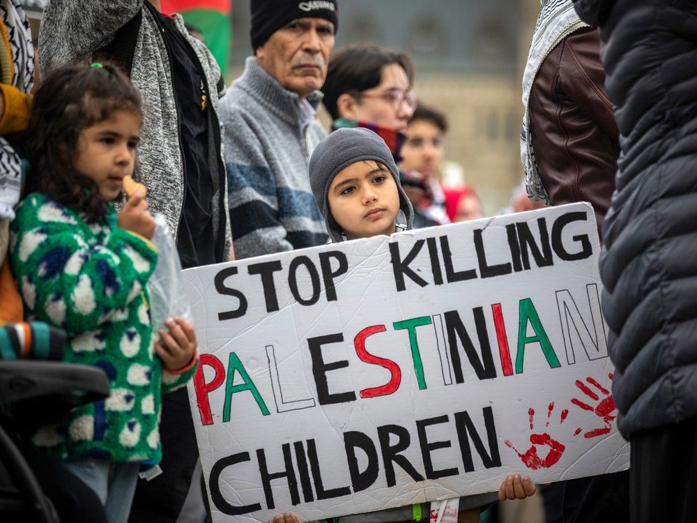 A large group organized by the Palestinian Youth Movement, INSAF UO, and the Students for Justice in Palestine Carleton came together on Parliament Hill then marched to the Embassy of Israel on O'Connor Street, Sunday, October 15, 2023.