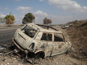 A destroyed car that was attacked by Palestinian militants on October 10, 2023 in UNSPECIFIED, Israel.