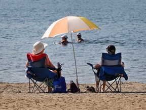 people were out enjoying the sunshine and swimming at Mooney's Bay Beach.