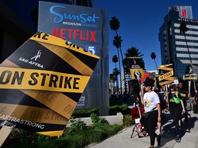 SAG-AFTRA members picket outside of Netflix's building in Hollywood on Friday. Talks between actors and studios over an ongoing strike collapsed on Oct. 12 in a blow to hopes for a swift end to a crisis that has crippled the entertainment industry.