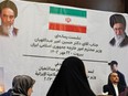 Iranian Foreign Minister Hossein Amir-Abdollahian, right, holds a press conference at the Iranian Embassy in the Lebanese capital Beirut on Oct.14, 2023.