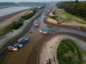 Aerial view of stranded boats and floating boats at Puraquequara Lake in Manaus, Amazonas State, Brazil