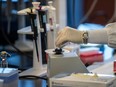 Laboratory technician works in the research centre of the Ste-Justine Hospital in Montreal on Nov. 7, 2016.