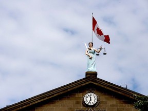 The statue of Sally Grant is shown atop Brockville's courthouse