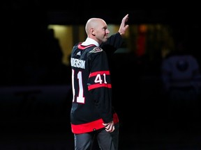 Former Senators goaltender Craig Anderson waves to the crowd during the pre-game ceremony to mark his retirement.
