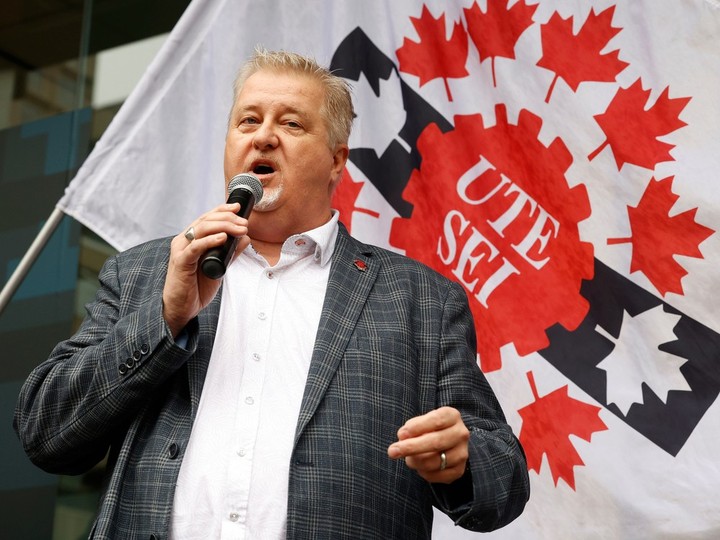  Marc Brière, national president of the Union of Taxation Employees, speaking during a rally at Canada Life’s Ottawa office on Wednesday.