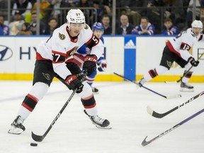 Ottawa Senators center Shane Pinto (57) looks to pass during the second period of an NHL hockey game against the New York Rangers, Thursday, March 2, 2023, in New York.