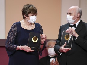 FILE - Japan Prize 2022 laureates Hungarian-American biochemist Katalin Kariko, left, and American physician-scientist Drew Weissman, right, pose with their trophies during the Japan Prize presentation ceremony Wednesday, April 13, 2022, in Tokyo. The Nobel Prize in medicine awarded to Katalin Karikó and Drew Weissman for enabling development of mRNA COVID-19 vaccines, it was announced on Monday, Oct. 2, 2023.