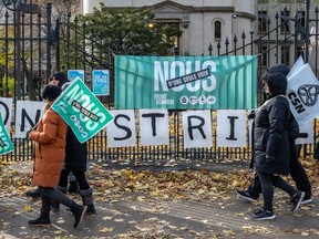The first day of the three-day common front strike amid negotiations between unions and the Quebec government at Dawson College in Montreal on Tuesday Nov. 21, 2023.