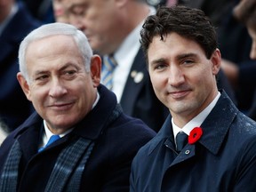 Israeli Prime Minister Benjamin Netanyahu and Canadian Prime Minister Justin Trudeau attend a ceremony in Paris on November 11, 2018 to commemorate the 100th anniversary of the armistice that ended the First World War.