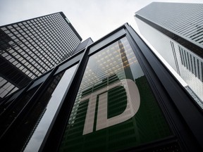 Signage for Toronto-Dominion Bank in Toronto. The bank missed analysts’ earnings estimates in the fourth quarter.