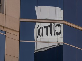 Citrix signage reflected in a window at the comapany's headquarters in Santa Clara, California, U.S., on Wednesday, Jan. 19, 2022. Elliott Investment Management and Vista Equity Partners are in advanced talks to buy software-maker Citrix Systems Inc., according to people familiar with the matter.