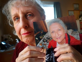 Karen Holden holding a picture of her sister, Linda