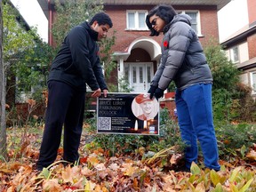History students at Glebe Collegiate researched Second World War veterans who once lived in the community surrounding the school, and put signs in front of homes where the soldiers once lived. Grade 10 students from Glebe Collegiate, Yassin Elhebiry and Kaamil Furtado, put one of their signs on the front lawn of a house near their high school Tuesday.