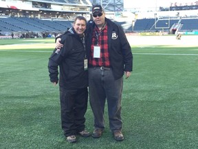 Loggersports coach Chris Ryan, right, with Jamie Bramburger at the 2015 Grey Cup game in Winnipeg.