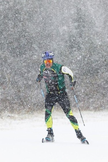 A heavy snowfall fell on Steven Paradine who got caught on his roller skis in the Gatineau Park, Nov. 13, 2023.