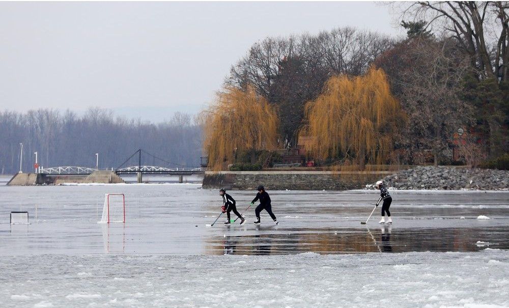 It was a warm day to skate on Lac Desch&ecirc;nes near Britannia Beach in Ottawa on Tuesday, Dec. 26, 2023.