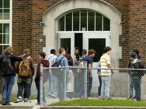Teens outside a school