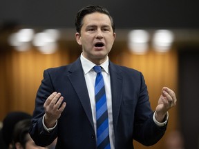 Conservative Leader Pierre Poilievre rises during question period, Tuesday, Dec. 5, 2023, in Ottawa.