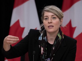 Melanie Joly responds to a question during a news conference, Thursday, October 19, 2023 in Ottawa. THE CANADIAN PRESS/Adrian Wyld