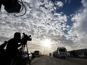 Trucks carrying humanitarian aid arrive at the Egyptian side of the Rafah border crossing with the Gaza Strip. "The ugliness that regularly visits Israel and the Palestinian territories has come much closer to home," write Adam Allouba and Howard Gerson.