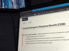 The Canada Revenue Agency says 185 employees have been fired to date for claiming a federal COVID-19 benefit when they were not eligible for it. The landing page for the Canada Emergency Response Benefit is seen in Toronto, Monday, Aug. 10, 2020.