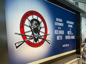 The Manitoba Métis Federation's sign at the Ottawa International Airport terminal was deemed political and offensive, and removed.